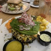 Massive raw plate, friend’s vegan sandwich in the background  at Saludpan in Medellin