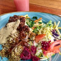 Brown rice and quinoa mixture, sauteed vegetables, salad, quinoa croquettes at Saludpan in Medellin