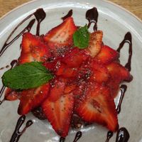 raw chocolate cake with strawberries at Saludpan in Medellin