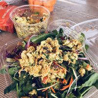 Garden salad topped with curried tofu  at Moonflower Community Cooperative in Moab
