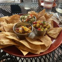 “Trio” chips and dip, with mango salsa, corn salsa, and guac   at Vegan Street in Calgary