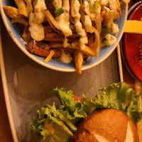 Bacun cheeze burger w/veggie patty and street fries at Vegan Street in Calgary