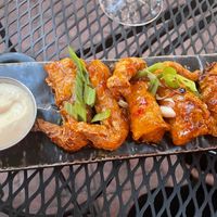 "skin-on" chick'n wings with chili sauce at Vegan Street in Calgary
