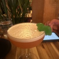 Dino-sour cocktail   at Vegan Street in Calgary