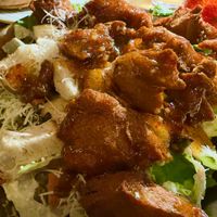 Cesar salad with vegan chicken  at Vegan Street in Calgary
