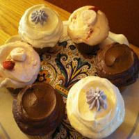 Banana cupcake with chocolate buttercream, spiced pumpkin rum cupcake with maple cream cheese frosting, and strawberry-banana cupcake--all vegan! at Bloom Bindery in Middleton