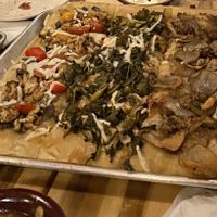 Large pizza with 3 different flavour combos. Vegan cheese   at Levant in Toronto