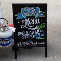 Vegan friendly notes on sign  at Fred's Fried Dough in Portland