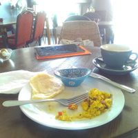 This is like real scrabbled egg.  I needed to stop eating to photograph the taste for you.  On real plates and cutlery now that Cumbia Kitchen is a café bar. at Cumbia Kitchen - Cafe Bar in St Leonards