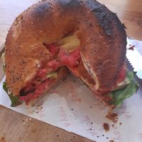 bagel with avocado and hummus at MOYA brunch in Sevilla