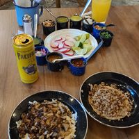 Tripa Fundido (left) and Asada taco (right) at La Ambivalencia Taquería in Guadalajara