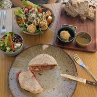 Vegieburger (from fejao beans). Falafel balls with Humus, bread, at Insensato in Tomar