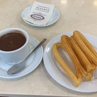 Vegan churros with chocolate at Chocolateria 1902 in Madrid