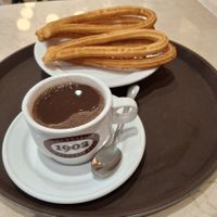 Chocolate and churros at Chocolateria 1902 in Madrid