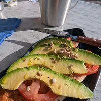 Tostada with avocado and tomato (half portion) at the Corner in Tenerife