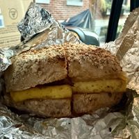 standard breakfast sandwich (baked tofu, impossible sausage, cheese, mayo on an Everything Philly Muffin.)  at Grindcore House in Philadelphia
