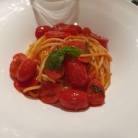 Spaghetti with tomatoes at Chi Burlaz Garden in Rimini