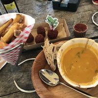 Vegan curry/coconut soup. Vegan beetroot bitterballen (saus was not vegan) fries are delicious and they have vegan mayo  at Fort aan de Klop in Utrecht