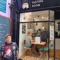 The outside (cool dude outside not likely to be there hahahaha) at The Tiny Tasting Room in Exeter