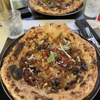 Baked pizzaa  at Isabella De Cham in Naples