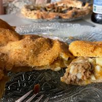 inside vegan fried pizza at Isabella De Cham in Naples