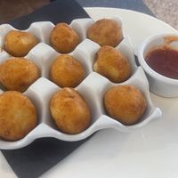 Croquetas de queso con mermelada de pimientos  at La Genuina in Nigran