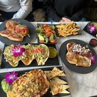 Eggplant parm with a side salad, butternut squash hero with fries, potato leek soup, pineapple fried rice and Loki tacos 😋😋😋  at Gaia & Loki in Jersey City