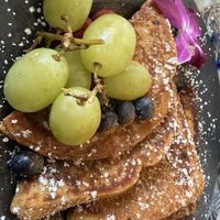 french toast - grapes are not as big as they appear!! 🍇🍇  at Gaia & Loki in Jersey City