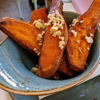Sweet potato wedges with cashews and truffle oil at Organico Juice Bar & Eatery in Liverpool