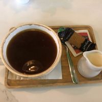 Americano w oat milk   at Organico Juice Bar & Eatery in Liverpool