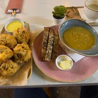 Seasonal spiced cauliflower soup and deep fried Cauliflower fritters at Organico Juice Bar & Eatery in Liverpool