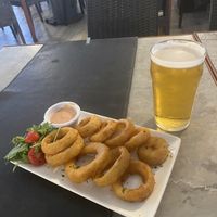 Onion rings (sauce not vegan)  at Surfside in Sliema