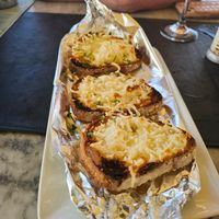 Vegan garlic bread, nothing special - just melted vegan cheese with some garlic. at Surfside in Sliema