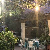 outdoor seating - view of the marina - next to main road at Akrogliali in Corfu