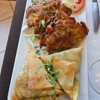 Vegetable samosas and onion bhajis at Spice Lounge in Albufeira