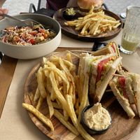 Club sandwich, vegan burger and a salad at My Habit in Corfu