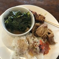 Tofu soup, cassava greens, tempeh satay, rice, jackfruit, and condiments😄33k for the plate   at Warung Green in Ubud