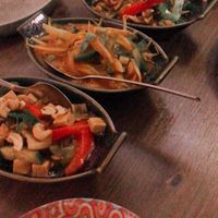 Half portions of different dishes. The second left one is the red curry dish, the other three are tofu dishes   at De Orchidee in Eindhoven