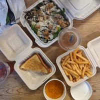 Caesar salad, 1/2 grilled cheese with tomato bisque, french fries at Innocent Yesterday in New York City