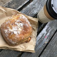 Almond croissant and coffee   at Innocent Yesterday in New York City