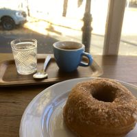 Vegan donut and espresso   at Rough Draft Bar & Books in Kingston