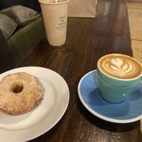Vegan donut & oat milk cortado  at Rough Draft Bar & Books in Kingston