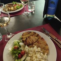 Vegan Burger (corn based, with vegetables), along with Rice and salad. at Xarez in Evora