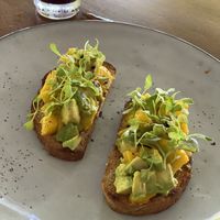Tostadas de aguacate con mango at Nula in Mal Pais