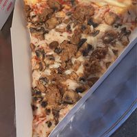 vegan sausage & mushroom slice  at Oz Pizza in San Francisco