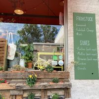 Outside and vegan sweets menu at Café Orange in Bonn