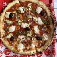 Vegan pizza w/bacon, artichokes, jalapeños and olives    at Pizzi*s & Cream in Vienna