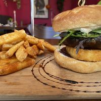 Mushroom burger with side of fries   at Bonobo Cafe in Christchurch