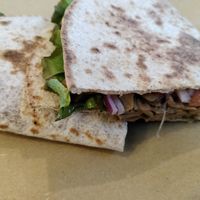 Piadina con kebab di Planted, lattuga, pomodoro, cipolla rossa e maionese vegana at Sbionta in Rimini