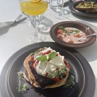 American pancakes, mimosa, rhubarb sprits, yoghurt parfait (vegan specified), avocado toast (vegan version specified)   at Kumi Oslobukta in Oslo